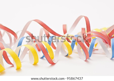 Studio shot of party streamers on white background