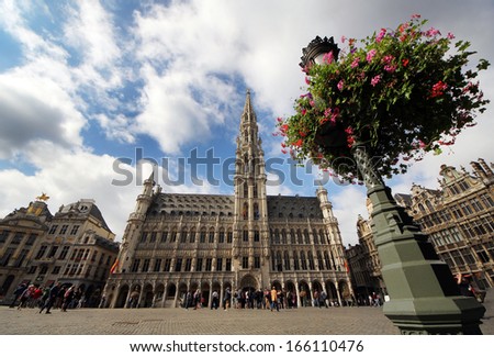 BRUSSELS, BELGIUM - SEPTEMBER 15 2013: The City Hall in Grand Place is the most famous and attractive place for hundreds tourists from all the world, especially for the unique baroque architecture