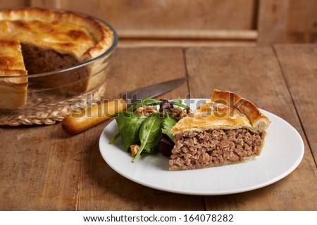 Tourtiere Canadian traditional meat pie on a dish