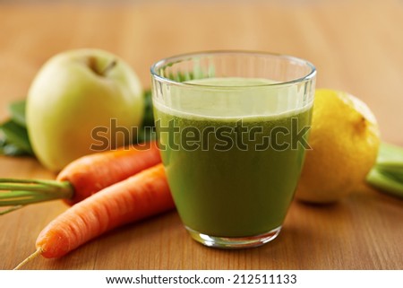 Homemade vegan green juice with fruit and vegetables