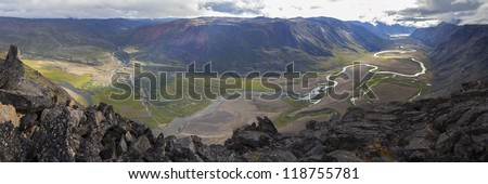 Elevated view of arctic valley with forest of arctic willow and river, Greenland