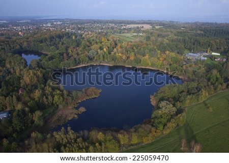 Aerial shot of small lakes in suburban area, Hoersholm, Denmark