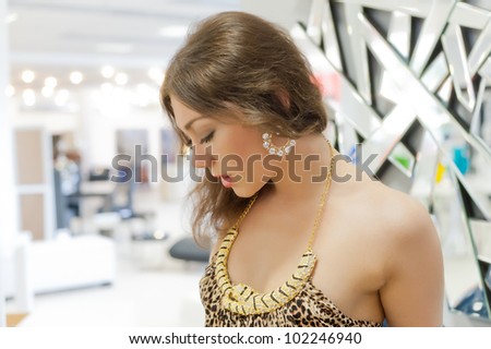 Close-up profile portrait of soft elegant young woman