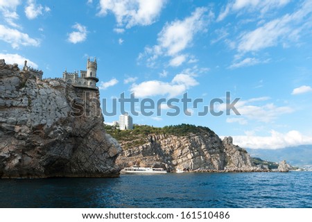 medieval knight\'s castle on a high cliff by the sea
