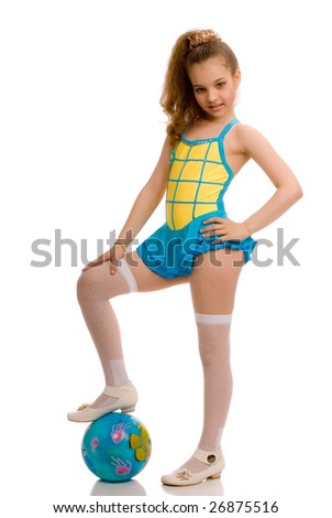 stock photo young adorable girl with a gymnastic ball at her feet 