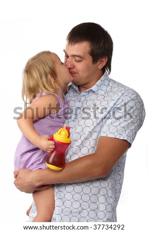 stock photo : handsome young father holding hands and kissing his daughter