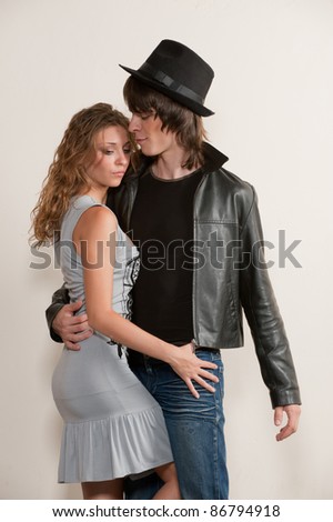 Picture of young couple, model posing in studio