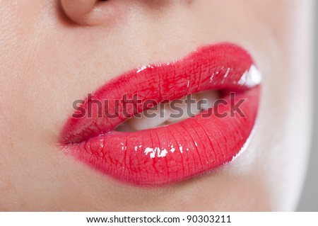 Close-up portrait of juicy, sensual, seductive and shiny lips