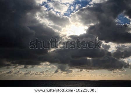 clouds with god rays on a beautiful cloudscape