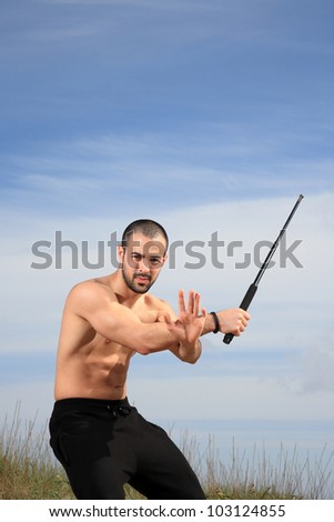 martial arts instructor exercising in the nature