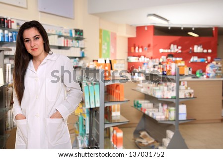 young female pharmacist at the pharmacy store