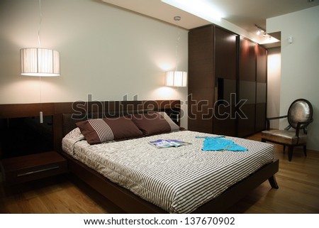 luxury bedroom with modern wooden furniture