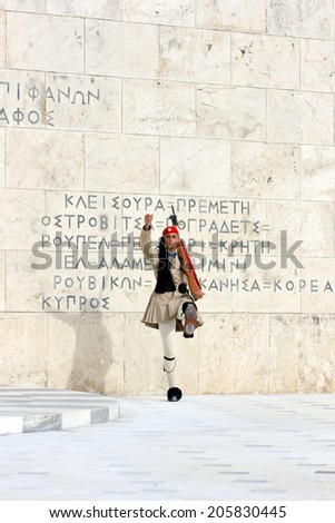 The Greek Presidential guard called Tsoliades dressed in traditional uniform at the monument of the unknown soldier in front of the Greek  parliament,Athens May 11th 2014