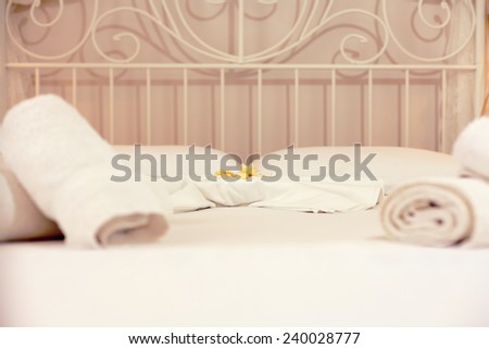 closeup of towels on a roll with decoration of a luxury bedroom