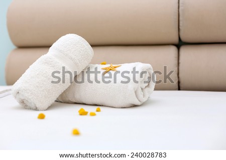 closeup of towels on a roll with decoration of a luxury bedroom