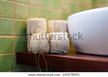 closeup of towels with rope in a luxury  bathroom