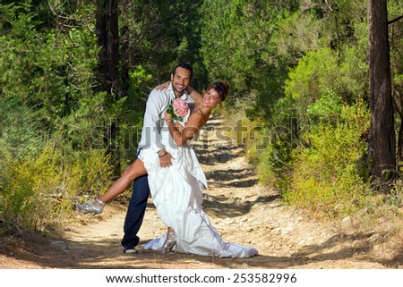portrait of a bride and groom in a greek island on their wedding day