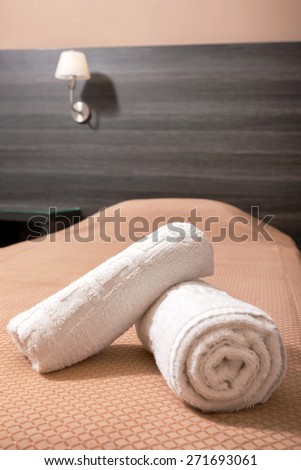 closeup of towels on the bed of a luxury hotel