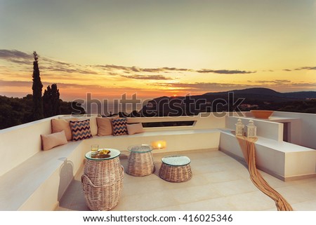 exterior with beautiful decoration of a luxury villa in the afternoon with sunset