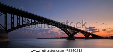 Peace Bridge at Sunset, Buffalo, NY. An international border crossing connecting United States and Canada.