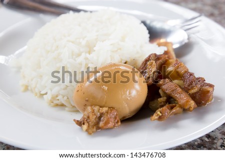 Rice with egg and pork in sweet brown sauce