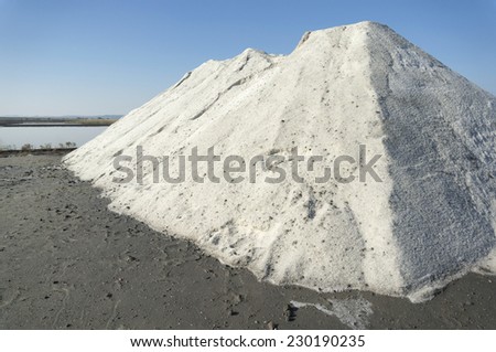 Big heap of sea salt extracted through natural evaporation at the salt lake near Burgas, Bulgaria