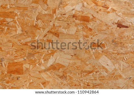 Plywood background of oriented strand board or OSB, great for builders and boarding up windows etc
