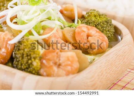 Prawns with Ginger and Spring Onion - Chinese dish of prawns, broccoli and water chestnuts with ginger and spring onion sauce served with steamed rice.