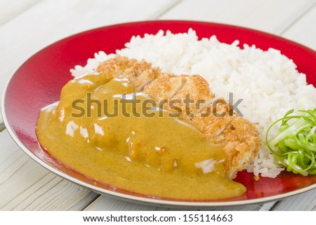 Katsu Kare - Japanese breaded pork cutlet with curry sauce and rice.