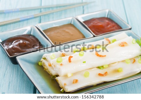 Cheong Fun - Chinese steamed rice rolls with dried shrimp and spring onion served with hoisin sauce, soybean paste and chili dip. Dim Sum / Yum Cha.
