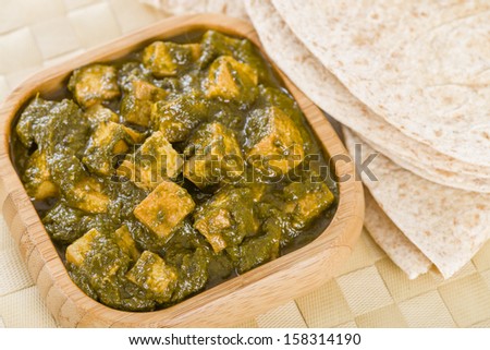 Palak Paneer - South Asian curry made with paneer (cheese) with pureed spinach sauce.