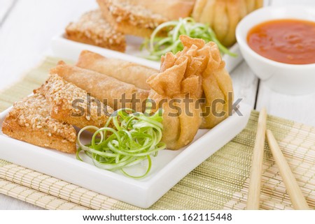 Asian Starters - Fried wontons, prawn toast and spring rolls served with sweet chili sauce.