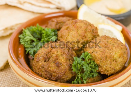 Falafel -  Middle Eastern chickpea and fava beans fried balls. Traditional spicy snack.