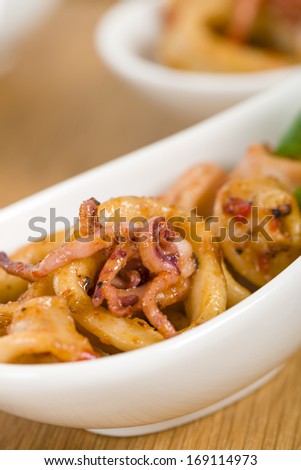 Fried Squid Rings - Pan fried squid rings with red pepper.