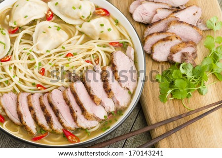 Wonton Noodle Soup - Chinese noodle soup with dumplings and sliced duck breast.