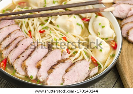 Wonton Noodle Soup - Chinese noodle soup with dumplings and sliced duck breast.