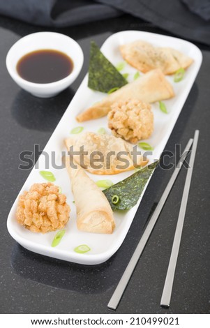 Fried Asian Snacks - Deep fried Oriental starters served with soy based dipping sauce.