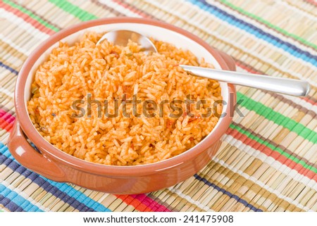 Mexican Rice - Rice cooked with tomato sauce and chicken broth.