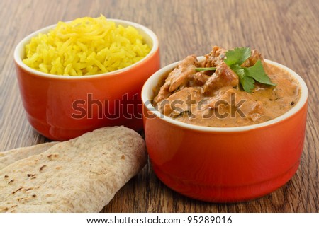 Butter Chicken & Lemon Rice - Indian butter chicken curry and lemon rice served with chapatis.