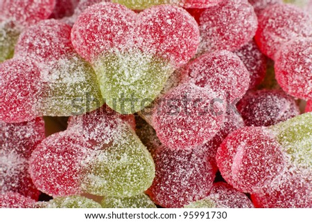 Sour Cherry Sweets - Close up of fizzy cherry flavoured gums.