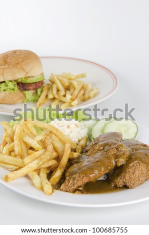 Western food-view chicken chop set and burger set on plate.