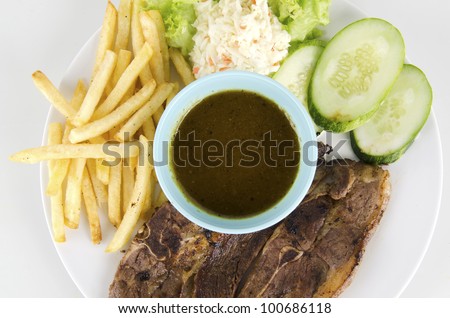 Western food-lamb chop set with black pepper sauce.