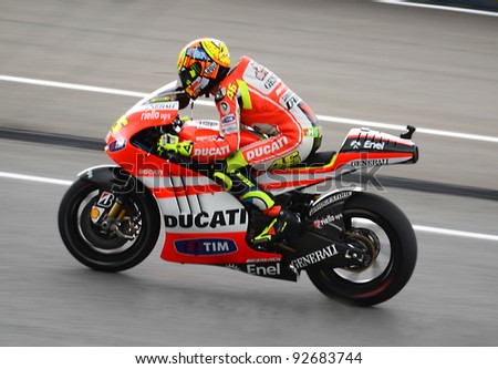 SEPANG, MALAYSIA-OCT 21: Valentino Rossi of Ducati Team in action during a practice session of the Malaysian Motorcycle Grand Prix on October 21, 2011 in Sepang, Malaysia.