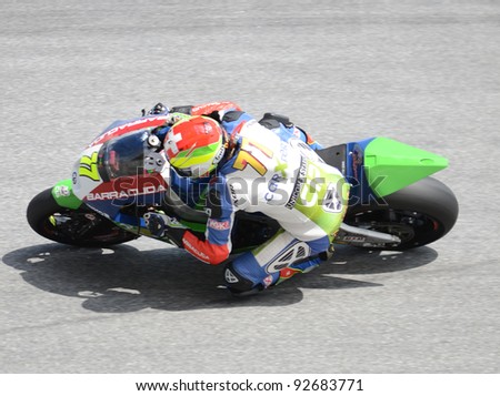 SEPANG,MALAYSIA - OCT. 21: Dominique Aegerter of Technomag-CIP in action during a practice session of the Shell Advance Malaysian Moto GrandPrix on Oct. 21 2011 in Sepang, Malaysia.