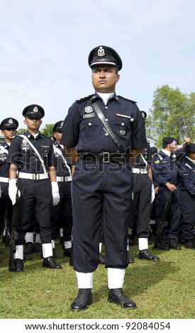 KUANTAN- SEPT 16:  Members of the Malaysian Police in the National Day and Malaysia Day parade, celebrating the 54th anniversary of independence on September 16, 2011 at Kuantan, Pahang, Malaysia.