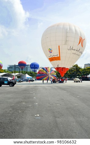 PUTRAJAYA, MALAYSIA-MAR 17:View of various type hot air balloon at the 4th Putrajaya International Hot Air Balloon Fiesta on Mar 17, 2012 Putrajaya. The event held in Precinct 2, Putrajaya, Malaysia.