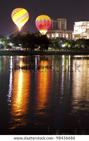 PUTRAJAYA, MALAYSIA-MAR 17: Raw view of hot air balloon in night session at the 4th Putrajaya International Hot Air Balloon Fiesta 17 Mar, 2012 in Putrajaya.
