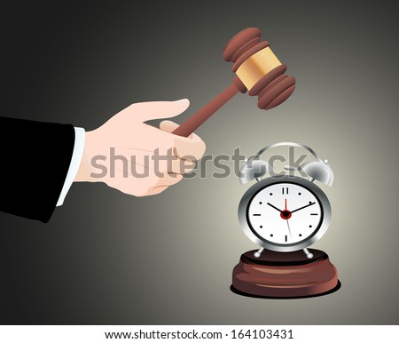 Gavel in hand and clock