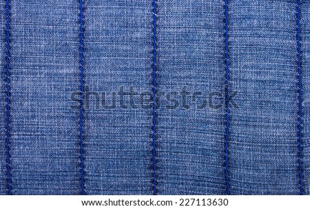 Blue Jeans Background With Vertical Finishing Lines