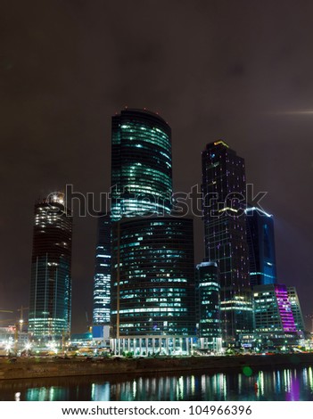 skyscrapers of Moscow City in the summer night sky in the background